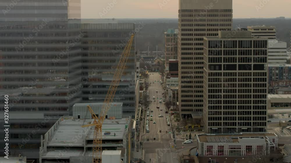 City street in Clayton Missouri at sunset with slow descent