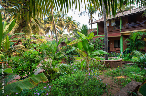 Garden and   one   building odf small hotel at South India