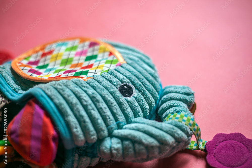 Elephant toy for baby on background Elephant toy for baby on background