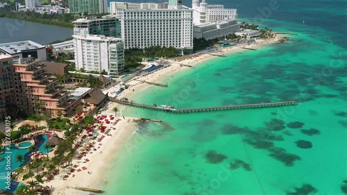 Aerial drone view over hotel resorts and the Carribean sea, in Cancun Mexico photo
