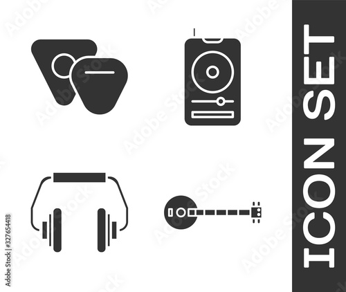 Set Banjo, Guitar pick, Headphones and Music player icon. Vector photo