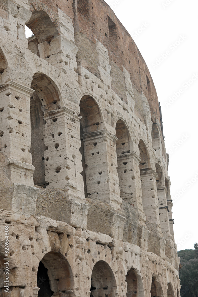 Colosseum in Rome and the holes made to recover the iron used du
