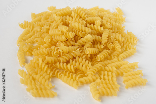 Italian spiral macaroni macaroni raw food , background.