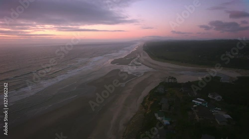 Aerial view of Oregon Coast at Sunset.  Shot from helicopter with cineflex gimal and RED 8K camera. photo