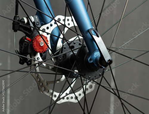 Bicycle disc brakes closeup. Break system on road bike.