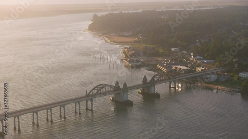 Oregon Coast circa-2019.  Aerial view of Siuslaw River Bridge in Florence, Oregon.  Shot from helicopter with cineflex gimal and RED 8K camera. photo