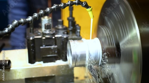 hydraulic lathe at work in a metalworking industry