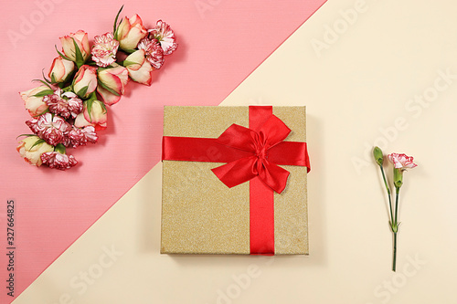 Arrangement of flowers on a pink isolated background, place for text, flat lay. Creative modern bouquet, minimal holiday and spring concept. Greeting card for Women's Day  ,happy birthday, wedding,  © Светлана Балынь