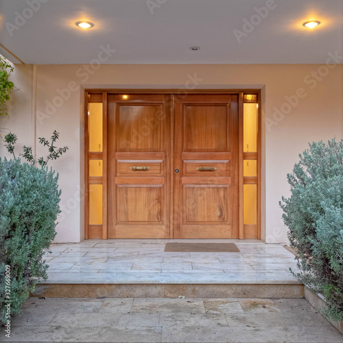 luxury house entramce wooden door early in the evening, Athens Greece