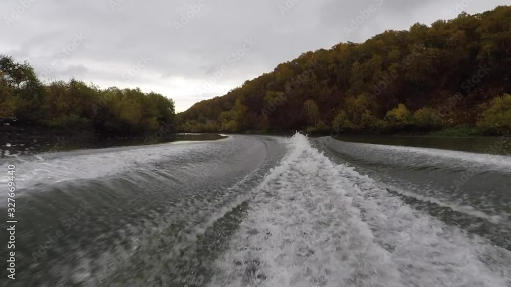 View from the stern of speedboat at the waves astern of the stern of the boat View from the stern of speedboat at the waves astern of the stern of the boat