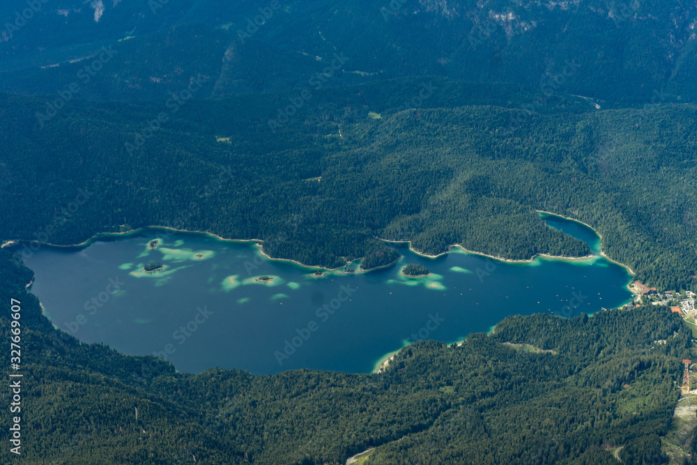 An aerial view of a beautiful mountain lake in bavaria, germany.