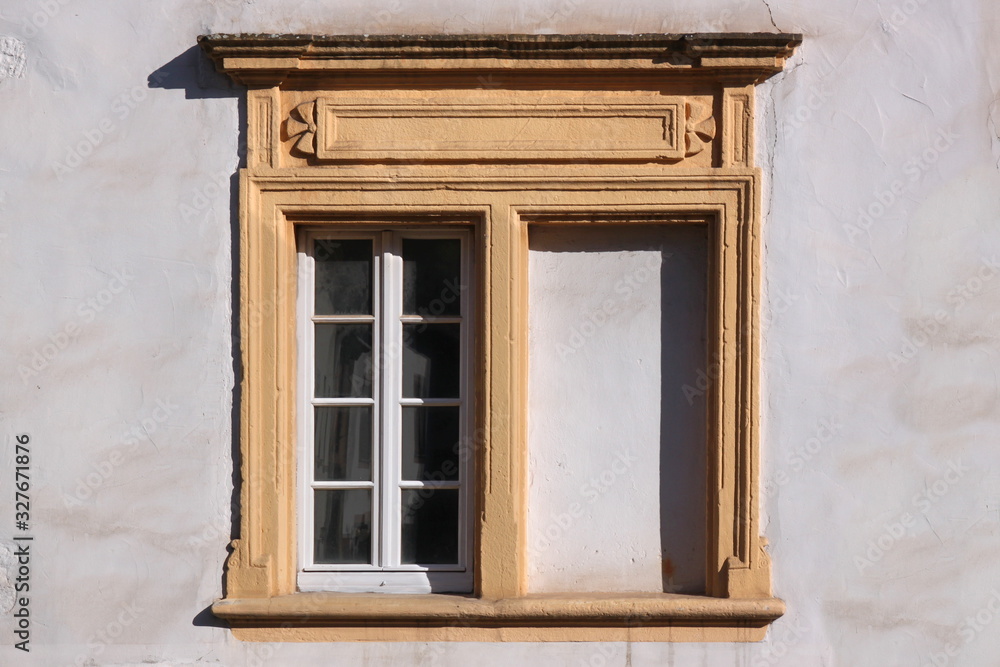 Renaissance twin frame with blind window at the Amtshaus building facade in the old town of Trier Pfalzel in Germany