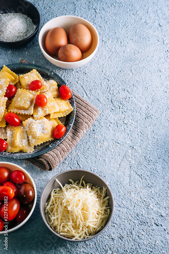 Obraz na plátně Delicious homemade stuffed ravioli with natural ingredients.