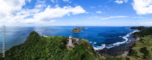 beautiful aerial panorama of tropical island with coloinal built lighthouse / palaui island  photo