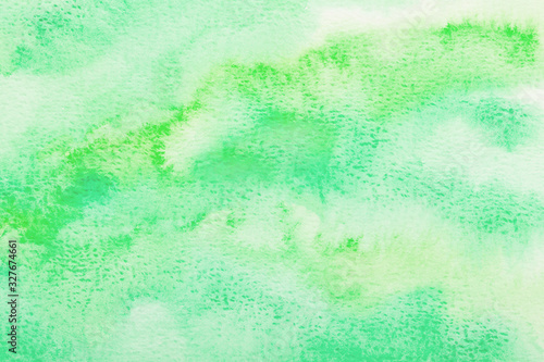 Green Watercolor Backgrounds. Hand drawn green texture © Pakhnyushchyy