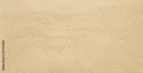 Fototapeta Tropical sand background. Sandy beach texture. Top view