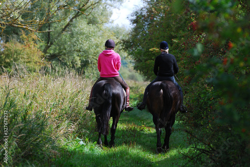 Horseriders in the countryside © Zsuzsanna Bird