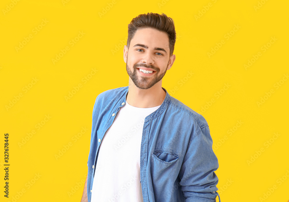 Handsome young man on color background Handsome young man on color background