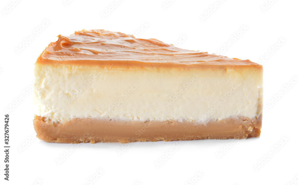 Slice of sweet caramel cheesecake on white background