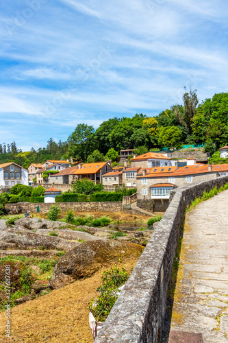 A Ponte Maceira view from the bridge in A Coruna Province, Galicia, Spain on the Fisterra-Muxia Way of St. James © Stanislava