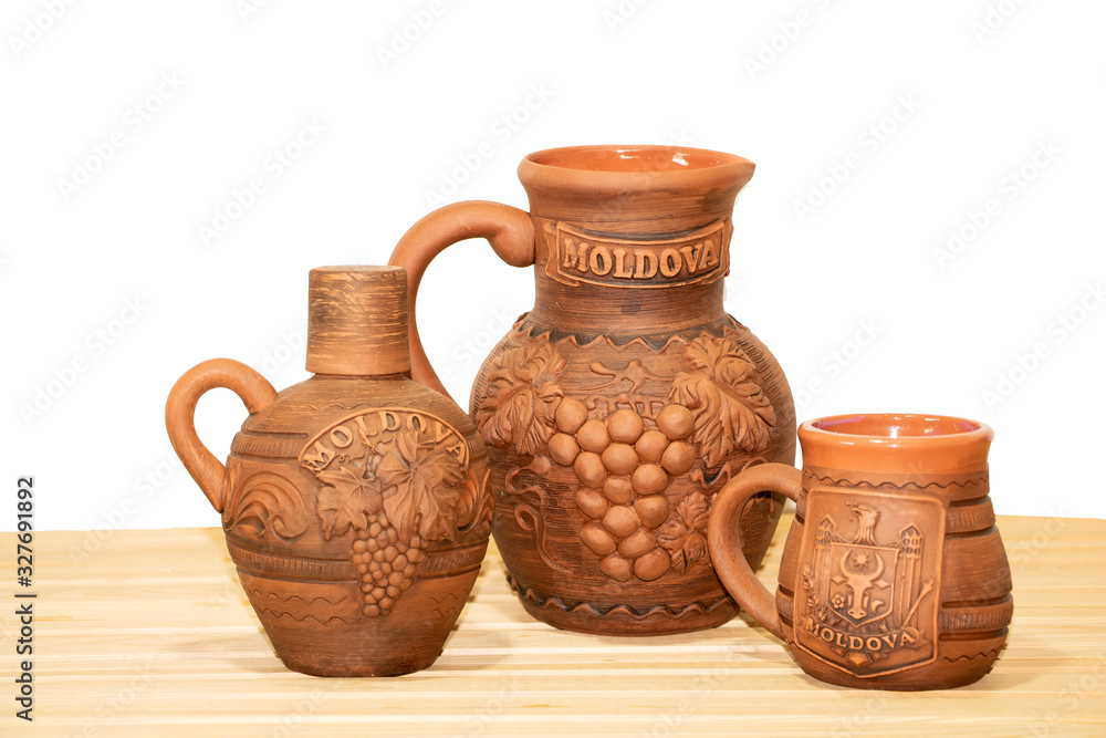 Souvenir from Moldova - Ceramic jugs on white background