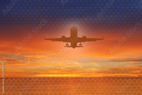 Silhouette of plane in the sky above Sea at Sunset. travel, flight, vacation Concept. Low key photo. relax time
