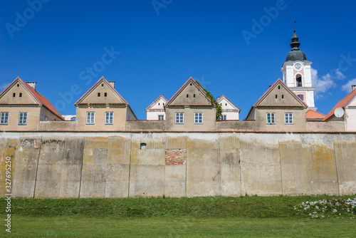 Hermitages and tower of Camaldolese monastery complex on the Wigry Peninsula in Podlasie region of Poland photo