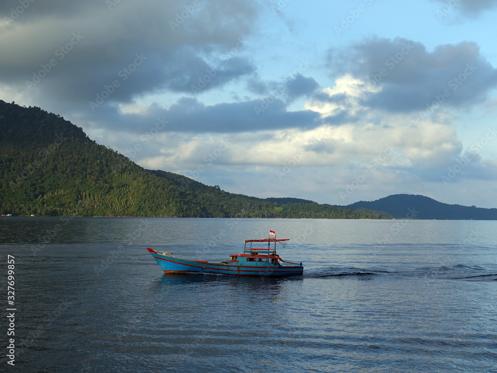 Anambas Islands Indonesia - colorful fishing boat cruising along