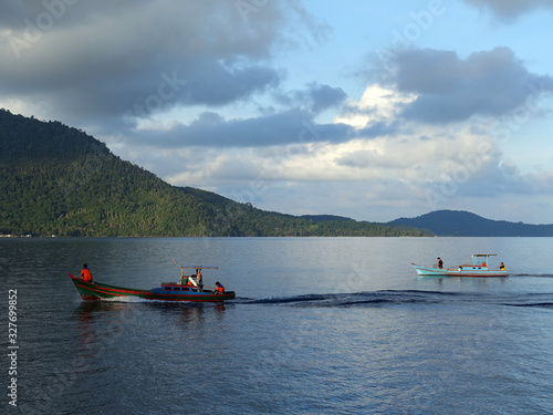 Anambas Islands Indonesia - colorful fishing boats cruising along