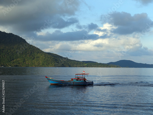 Anambas Islands Indonesia - colorful fishing boat cruising along © Marko