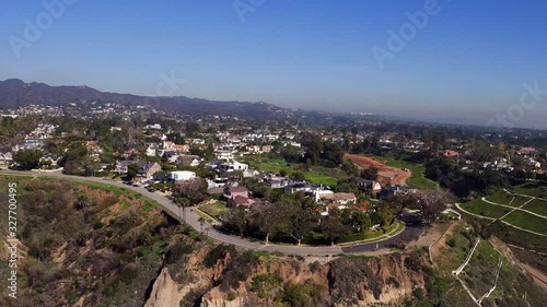 Pan right aerial, Pacific Palisades coastal homes
