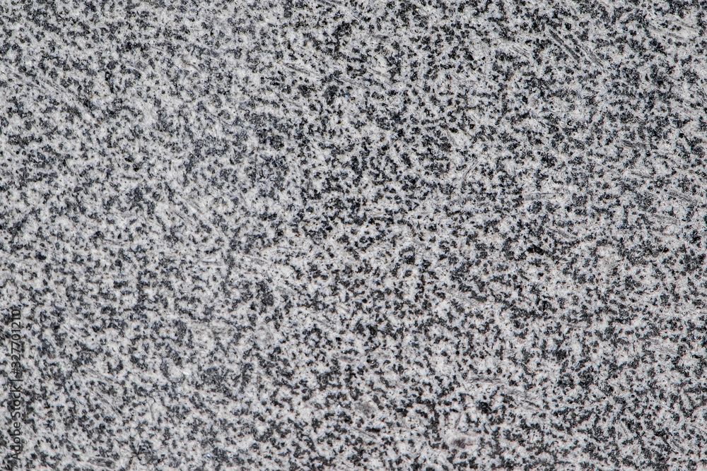 Texture of gray granite closeup Texture of gray granite closeup
