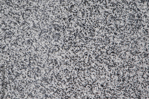 Texture of gray granite closeup