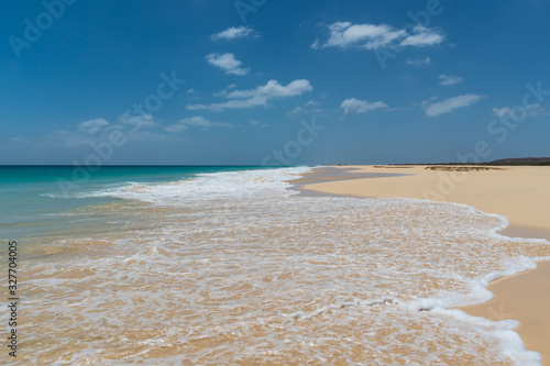 Sandy beach of Santa Monica in Boa Vista, Cape Verde under the blue sky