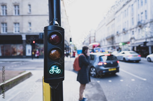 Photography green cycle traffic light in the city of London