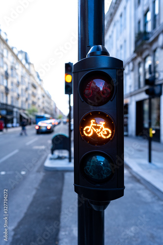yellow cycle traffic light in the city of London