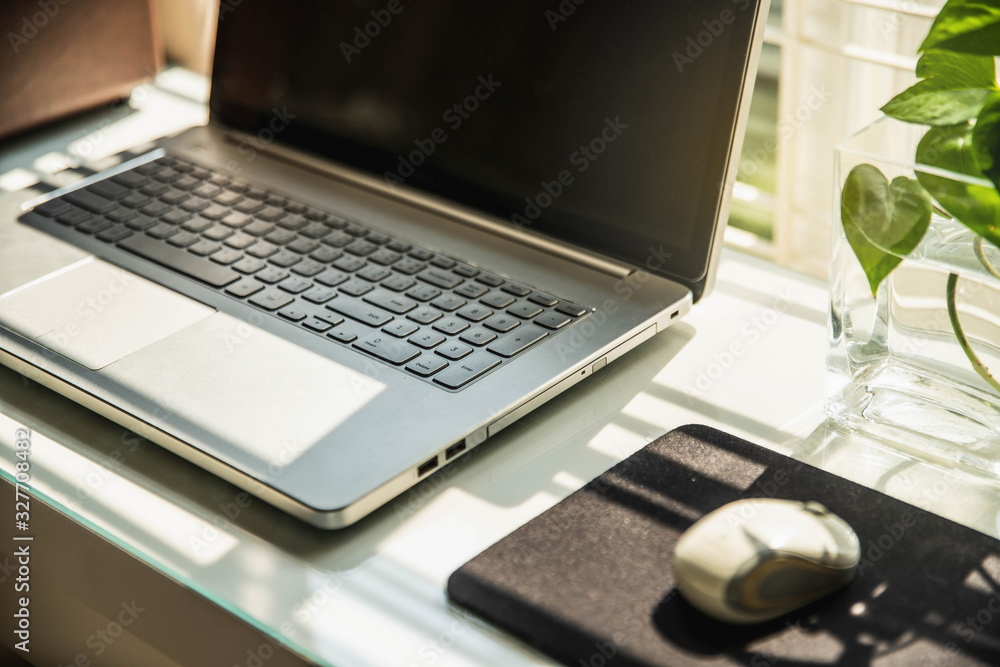Computer Laptop in home office background .Businessman working laptop for new project. Notebook on the table. Computer Laptop in home office background .Businessman working laptop for new project. Notebook on the table.