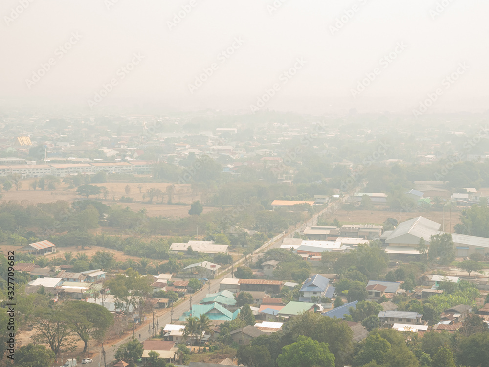 Smog caused by forest fires and burns in agricultural areas makes the weather in the northern region of Thailand full of small dust pm 2.5.