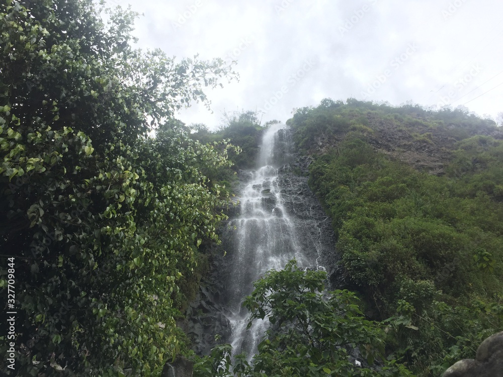 A large and very high waterfall that can be found in banos A large and very high waterfall that can be found in banos