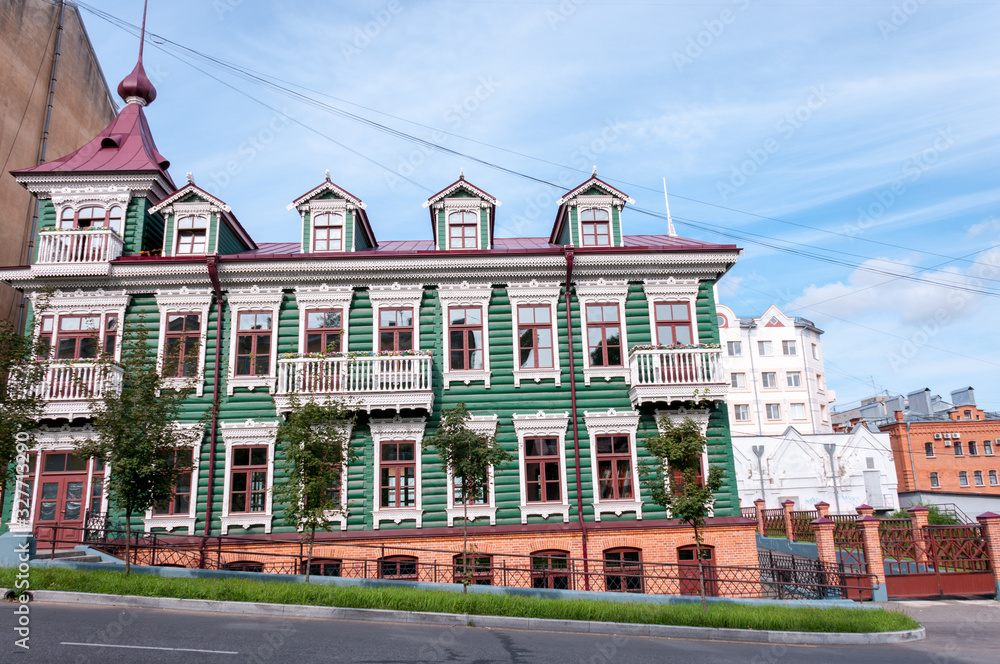 Russia, Khabarovsk, August 8, 2019: restored wooden beautiful house in the center of Khabarovsk