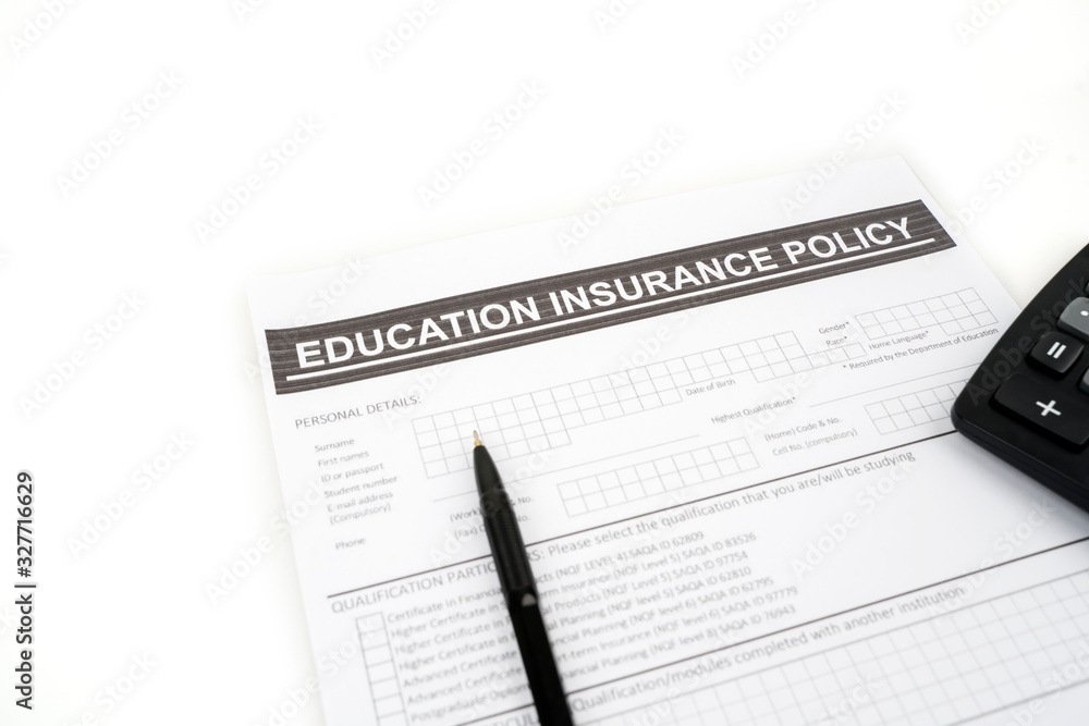 Education insurance policy document beneath a pen Education insurance policy document beneath a pen