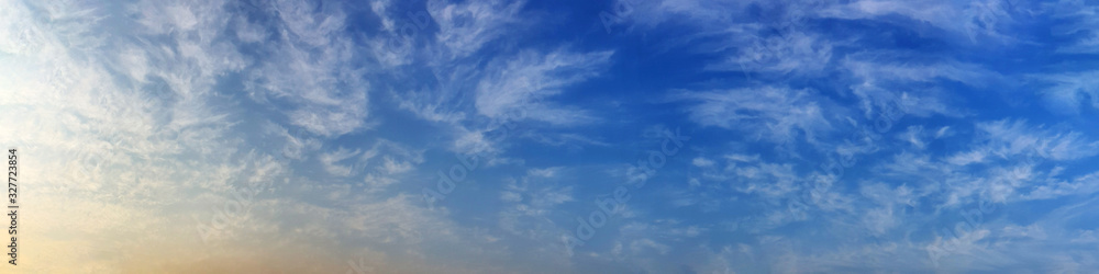 Panorama sky with cloud on a sunny day. Beautiful cirrus cloud. Panoramic image.