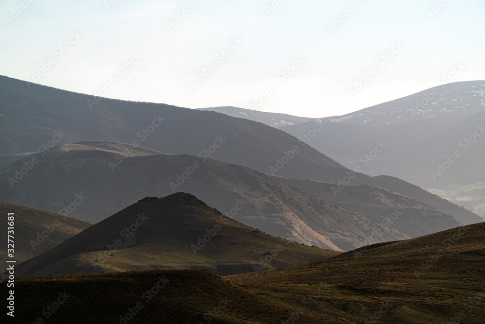 Mountain ridge terrain in haze landscape
