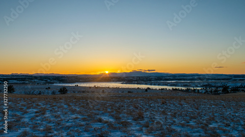 Frozen lake sunset