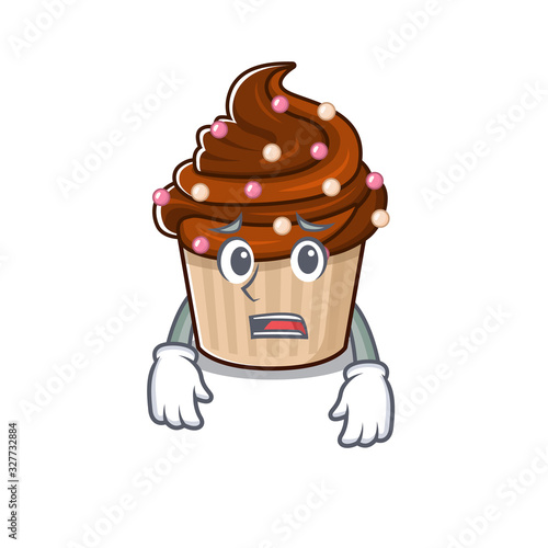 A picture of chocolate cupcake having an afraid face