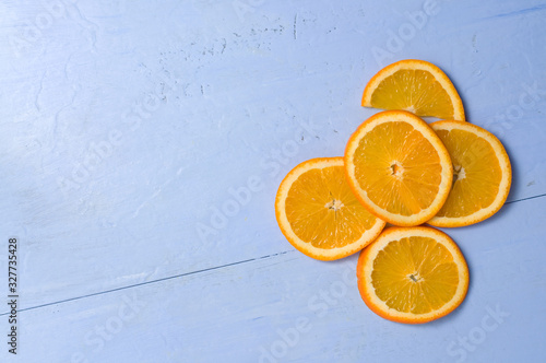 Orange Slices Centered with Blue Background