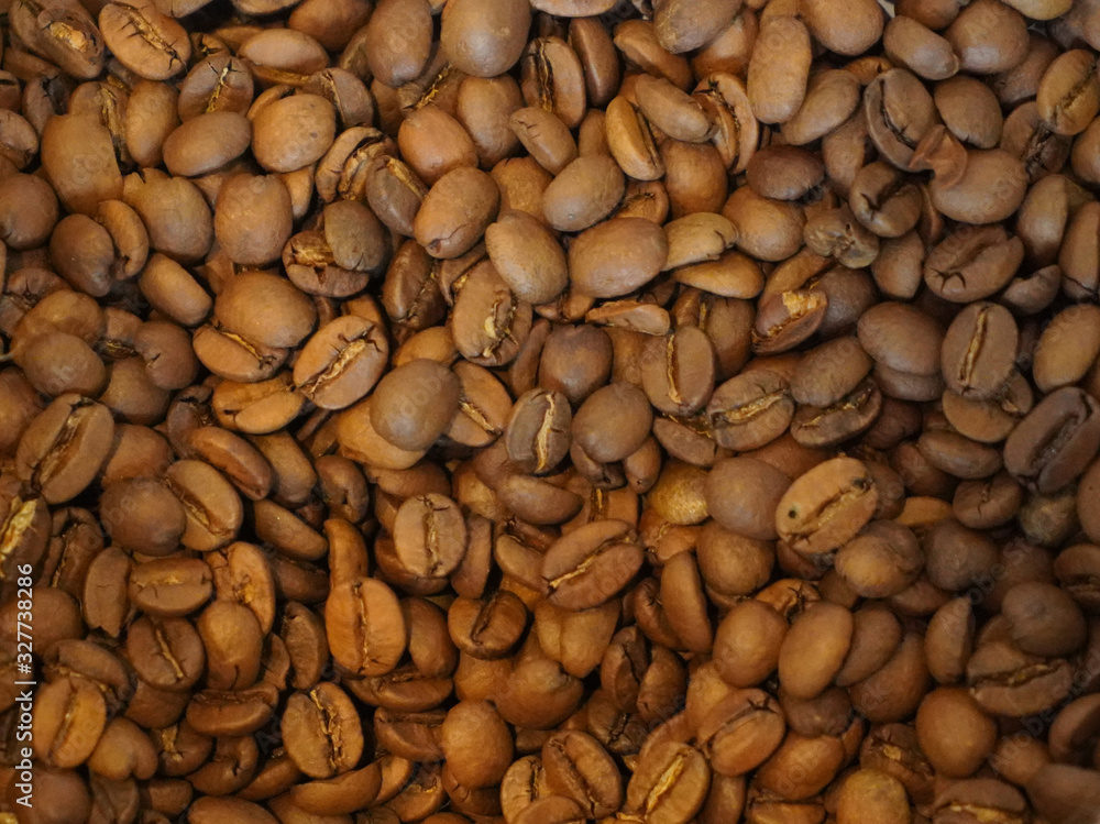 Background image of many coffee beans filling the picture
Background image of many coffee beans filling the picture