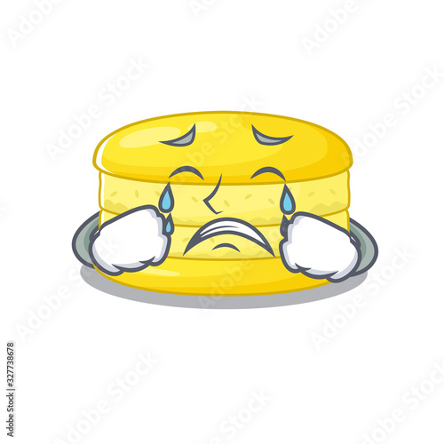 Lemon macaron cartoon character concept with a sad face