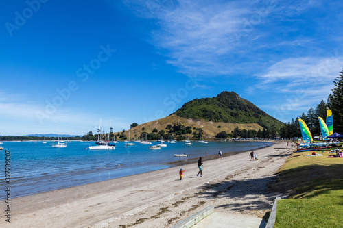 View of a beach and Mount Maunganui near Tauranga  located at the Bay of Plenty region on New Zealand s North Island.