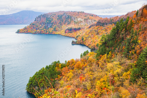 Colorful Scenic view of Towada Lake and maple trees on Kankodai Observation Deck in autumn, Towada Lake, Aomori, Japan photo